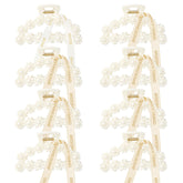 Barrette DEEKA avec perles blanches et ruban doré, idéale pour rehausser une coiffure.
