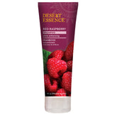 Shampoing Desert Essence Framboise Rouge en bouteille, brillance durable.