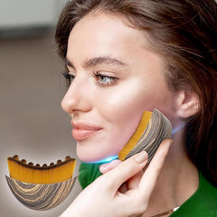 Brosse lymphatique visage, design précis pour contours et mâchoire.