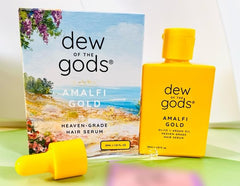 Dew Of The Gods Amalfi Gold Sérum pour cheveux, bouteille, nourrit et dompte les frisottis.