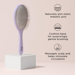 Brosse Diane anti-frisottis à pins métalliques pour cheveux plus lisses.