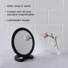 Miroir Diane avec poignée portable, idéal pour retouches en déplacement.