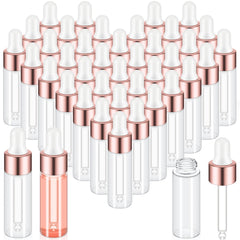Bouteille goutte mini-verre Didaey avec cap or rose, parfait pour échantillons en voyage.
