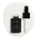 Sérum TBT de DIME Beauty, flacon élégant évoquant un emballage durable et sans cruauté.