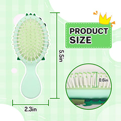 Brosse Dinatis mini-dino compact vert, idéale pour les voyages et sacs à dos.