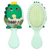 Dinatis brosse pour tout-petits avec dino vert et coussin d’air pour démêlage en douceur.