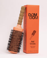 Brosse Dom Dom Céramique #6 avec barillet ventilé pour un séchage rapide et volume.