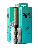 Brosse Dom Dom ronde avec poils sanglier et nylon, démêle et lisse les longueurs.