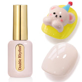 Double Rhythm vernis gel, bouteille ronde dorée, 15 ml, pour une application précise et durable.
