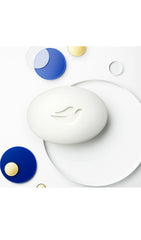 Dove savon en barre, mains en mousse, hygiène douce et hydratation.