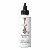 dpHUE Glossy Glaze brun foncé sur bouteille, brillance lumineuse sans alourdir les longueurs.