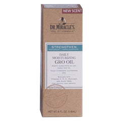 Application de Dr. Miracle's Gro Oil sur cheveux pour hydrater et lisser.