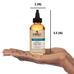Texture onctueuse de Dr. Miracle's Gro Oil prête à être appliquée.