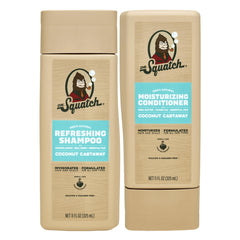 Dr. Squatch Shampoing Coconut Castaway en flacon pour cheveux propres et parfumés.