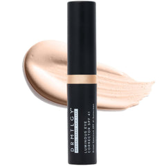 DRMTLGY Correcteur yeux teinte lumineuse SPF41 en flacon pour un regard plus uniforme.