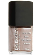 Dr.’s Remedy Enriched Nail Polish Poised Pink Champagne bottle with non-toxic formula.