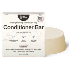 The Earthling Co. barre-conditionneur-demelant démêle les nœuds pour un coiffage facile.