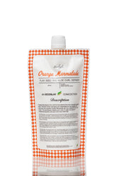 Ecoslay Orange Marmalade, bouteille: définition des boucles et tenue prolongée.