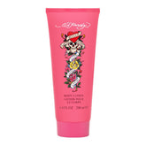 Lotion corporelle ED HARDY Christian Audigier dans une bouteille élégante, douceur et hydratation.