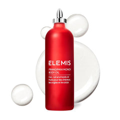 Bouteille d'huile ELEMIS Frangipani Monoi; hydratation luxueuse pour peau et cheveux.