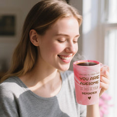 Tasse rose Eletorot avec inscription motivante, parfait pour des moments café relaxants.
