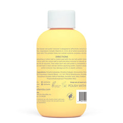 Bouteille Ella+mila de démaquillant jojoba avec vitamines pour ongles naturels.