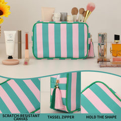 EMBRUNIOICE sac-maquillage avec zip et pompon, détail tendance et pratique.