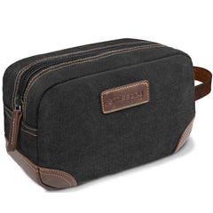 Sac emissary de toilette pour homme en cuir et toile noir, ouvert, prêt à l'emploi.
