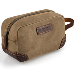 Trousse de toilette Emissary en cuir et toile marron, vue avant, pratique en voyage.