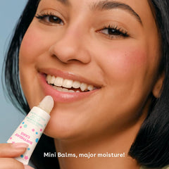 EOS Mini creme de la creme Vanille Confettis, tube pratique pour une douceur hydratante.
