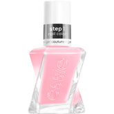 Essie Gel Couture montre sa bouteille lumineuse avec la teinte rose thé translucide, pour une tenue durable.