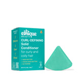 Ethique barre apres-shampooing definissant les boucles avec beurre de karité pour hydratation légère.