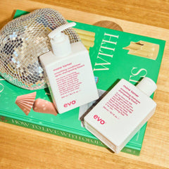 EVO Mane Tamer Shampoo — etiquette claire montrant les bénéfices anti-frisottis.