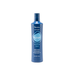 Fanola Wonder bouteille bleue, neutralise les tons orange sur cheveux éclaircis pour un rendu frais.
