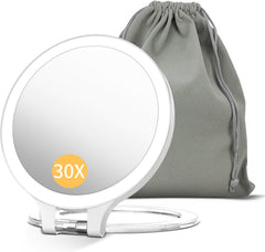 Miroir FASCINATE 10× et 1×, double-face pour un maquillage précis et net.