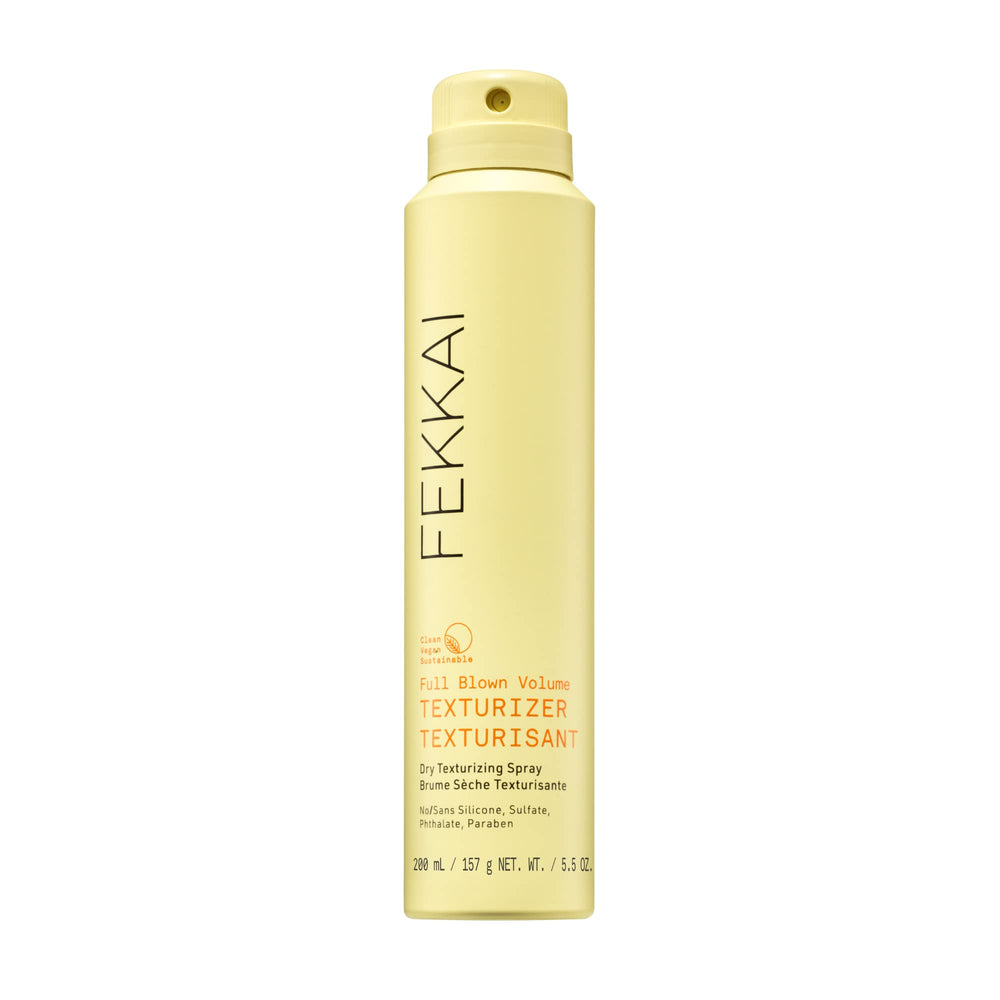 FEKKAI Full Blown Volume Texturizer : bouteille montrant le produit pour un volume durable.