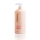 Fekkai après-shampoing couleur : bouteille 1L prolonge l'éclat des cheveux colorés.