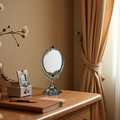 Miroir Feyarl bronze fini fleuri, élément décoratif chic.