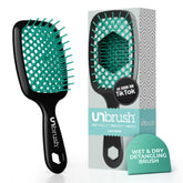 FHI Heat UNbrush dans la couleur Lagoon, démontrant le démêlage sans douleur