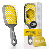 La brosse FHI Heat UNbrush démonte les nœuds en douceur pour tous les types de cheveux.