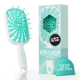 FHI Heat UNbrush Plus avec 84 soies UltraFlex pour démêler en douceur les boucles fragiles.