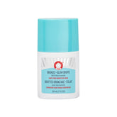First Aid Beauty Bronze + Glow Drops — bouteille en gros plan, éclat délicat