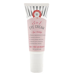 First Aid Beauty Crème Yeux 5-en-1, bouteille, révèle un regard plus frais et lumineux