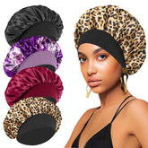 FIRSTPELLA bonnet soie noir pour dormir, protège les cheveux et évite les frottements.