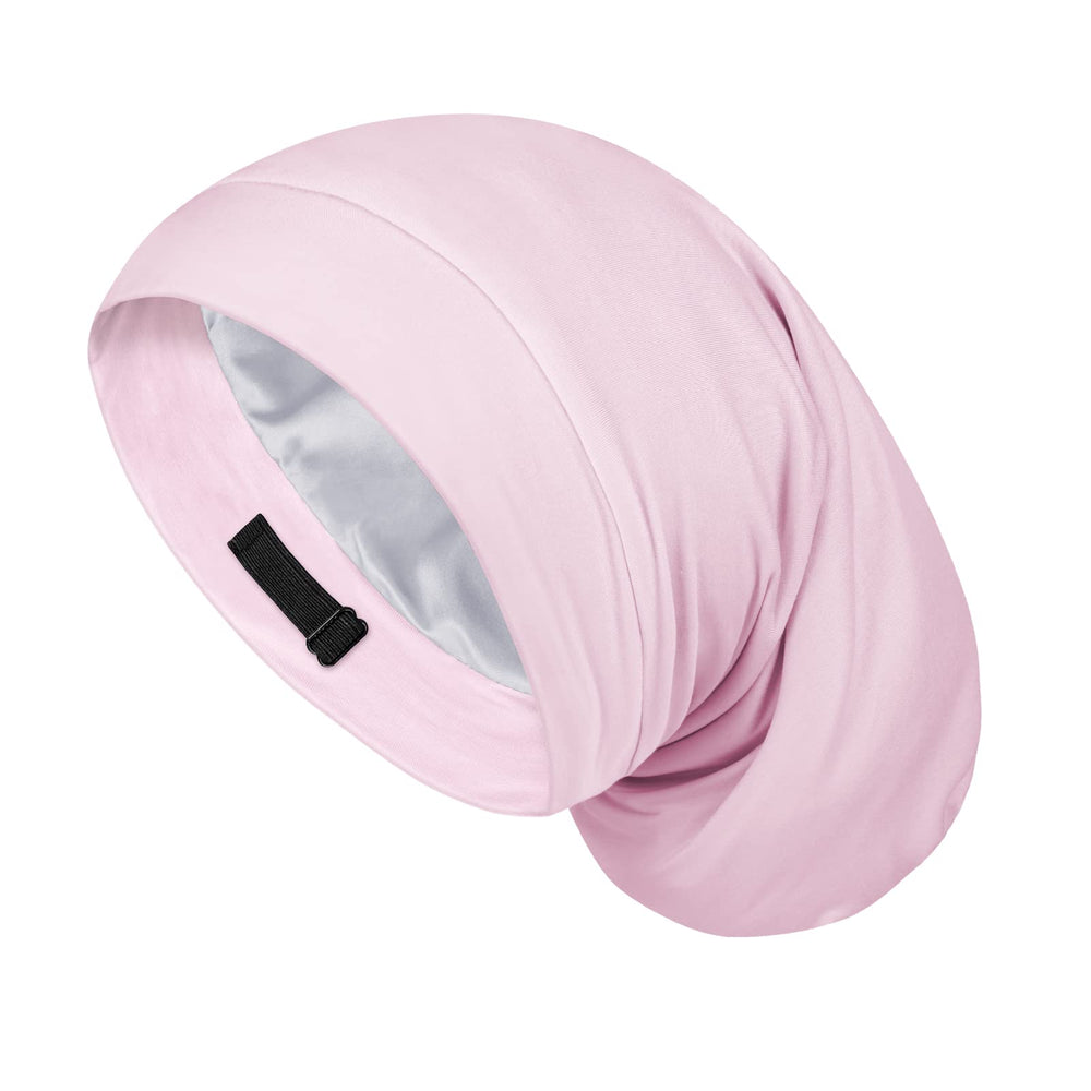 Bonnet Fittia satin dormi rose protège les cheveux et favorise l'hydratation nocturne.