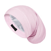 Bonnet Fittia satin dormi rose protège les cheveux et favorise l'hydratation nocturne.