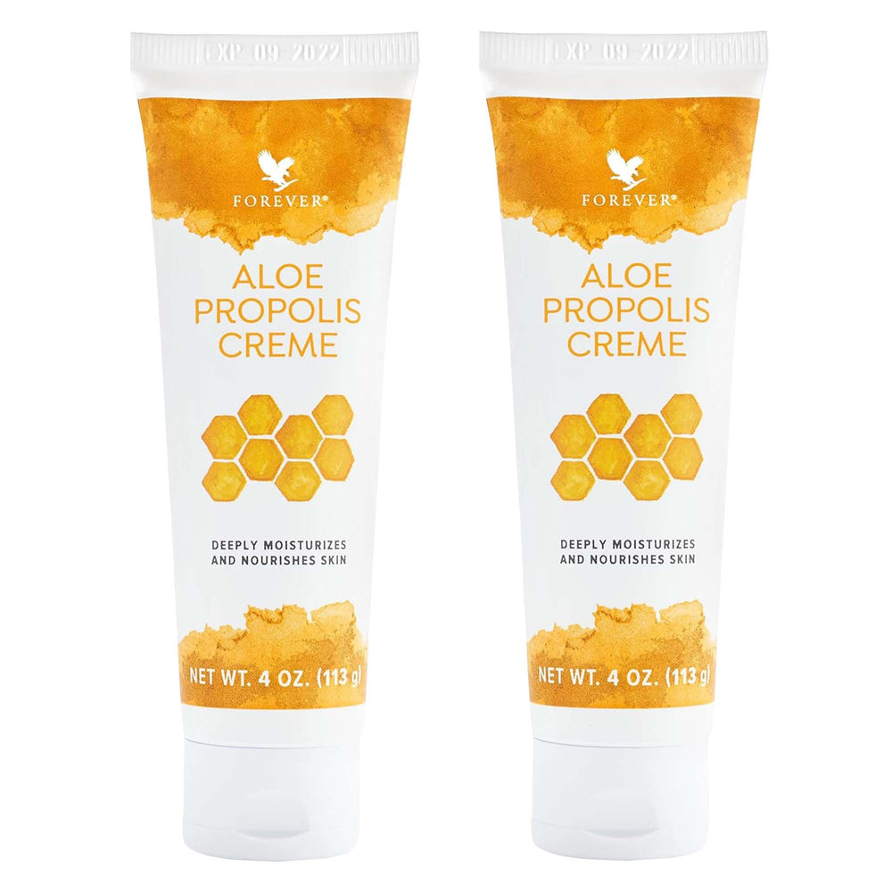 Forever Living Aloe Propolis Crème – pot ouvert, texture riche et nourrissante prête à l’application.