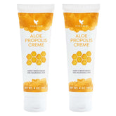 Forever Living Aloe Propolis Crème – pot ouvert, texture riche et nourrissante prête à l’application.