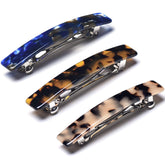 Barrette Fsmiling en acétate bleu marine, style élégant et tenue sans glissement.