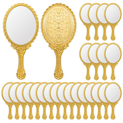 Miroir à main vintage FUPMILPHRANX, décor fleurs dorées, utile pour retouches maquillage en déplacement.